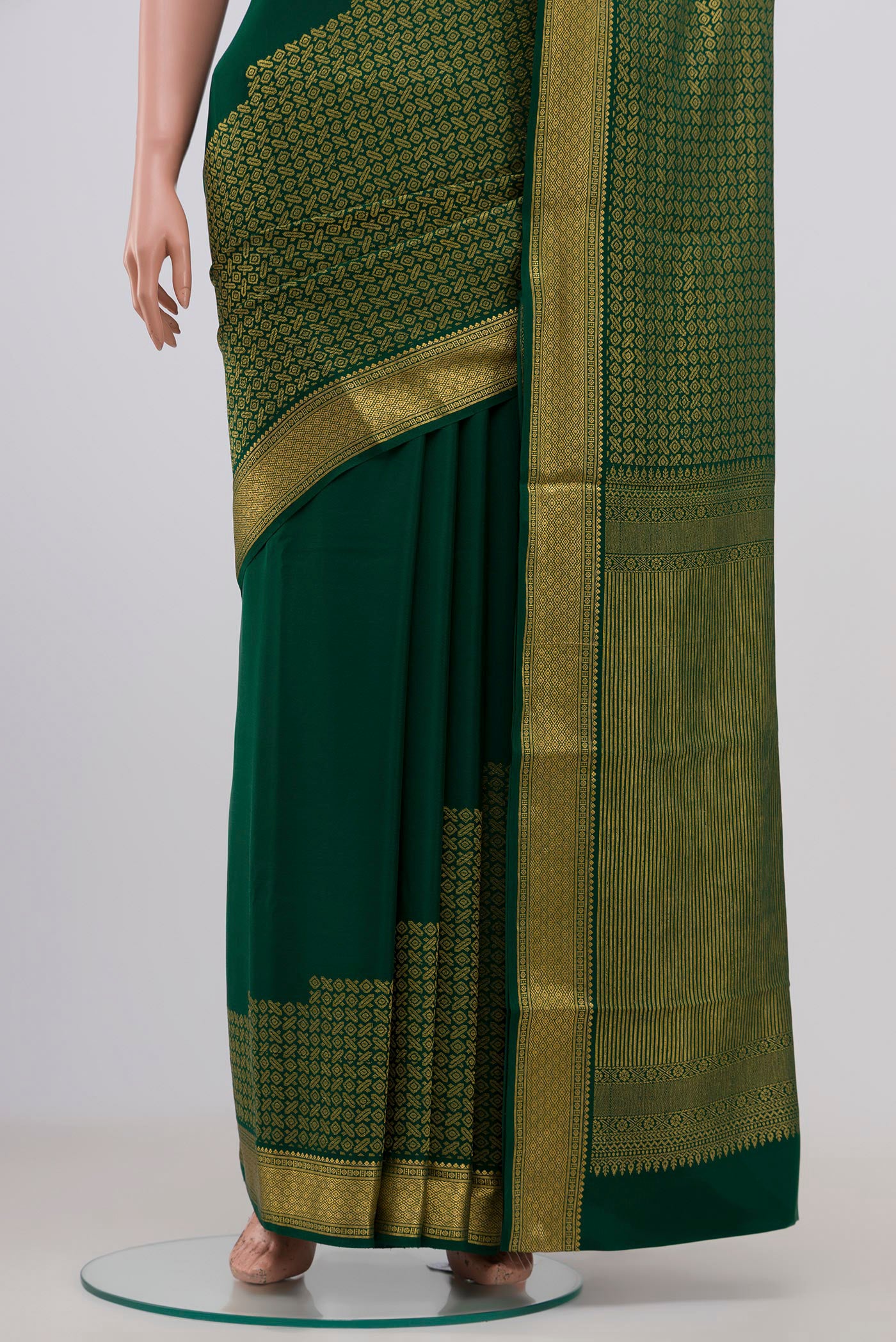 Pleats and pallu of Green Mysore Crepe Saree with Zari Brocade on the body and Zari Border. 