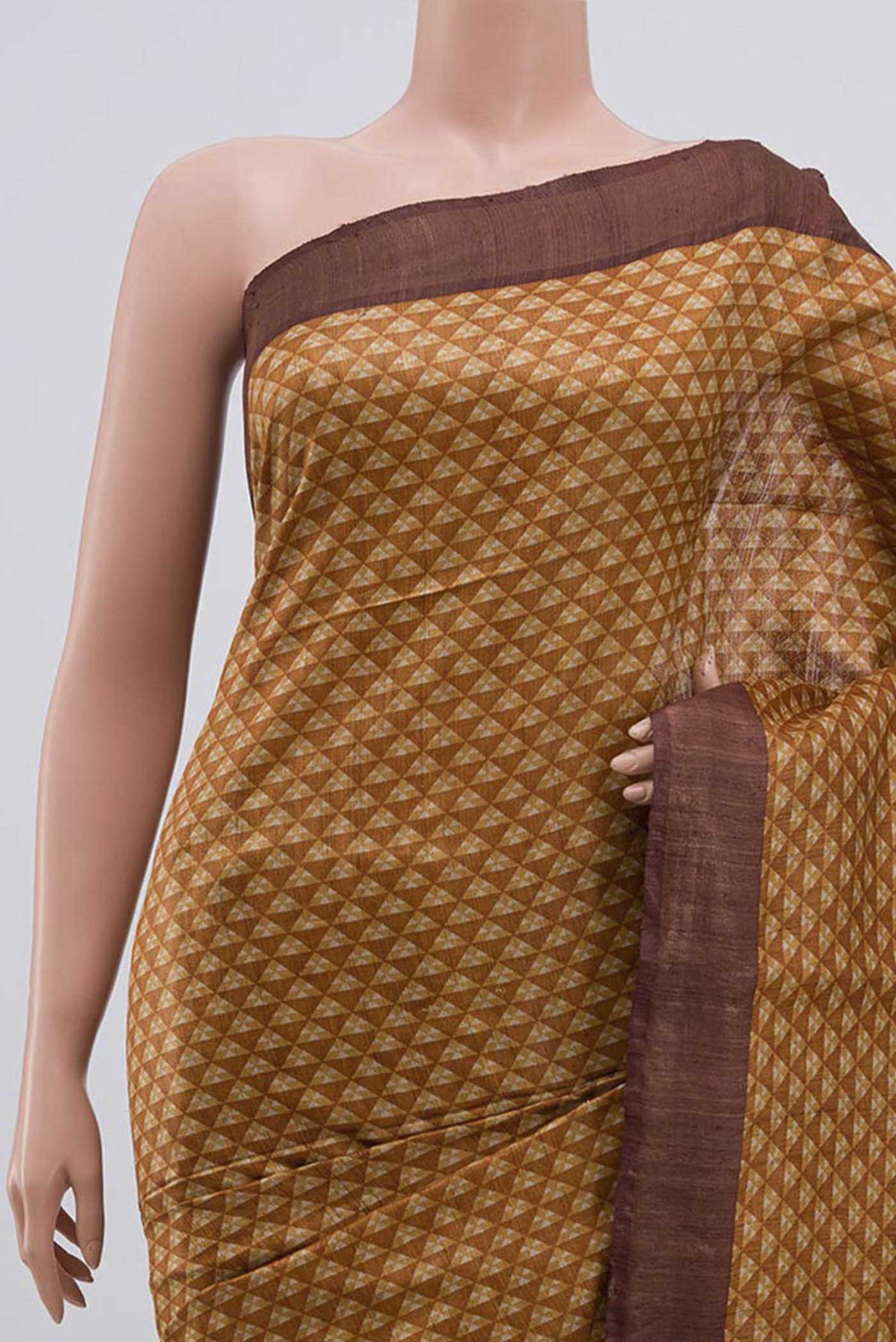 Border image of Mustard Bhagalpuri Tussar Silk Saree with Printed design on the body and Zari Border