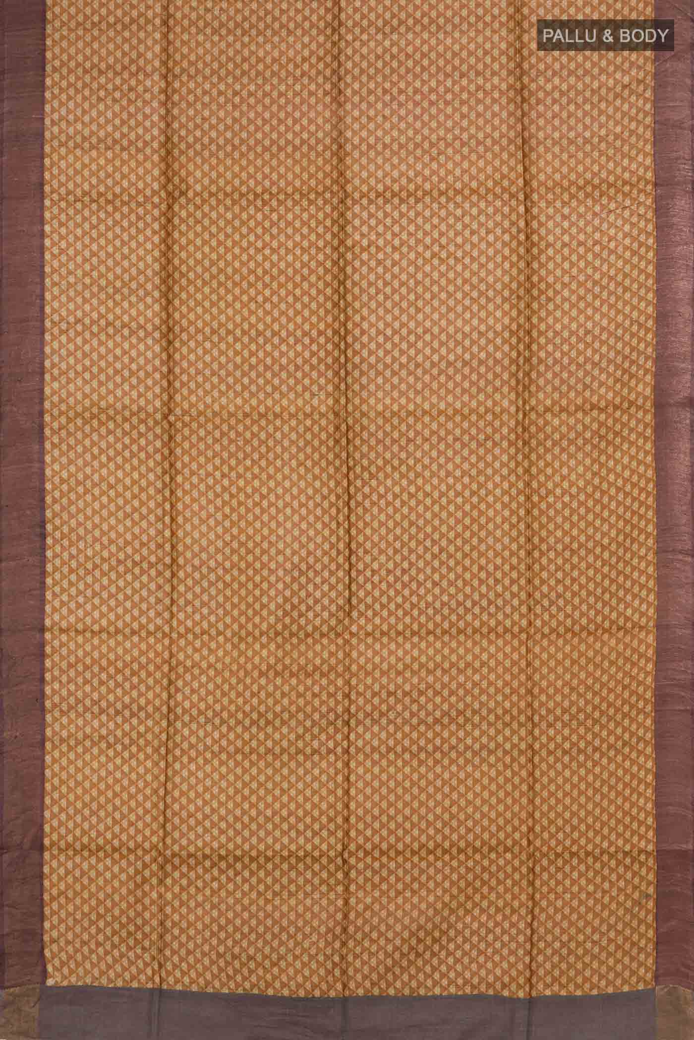 Flat view of Mustard Bhagalpuri Tussar Silk Saree with Printed design on the body and Zari Border