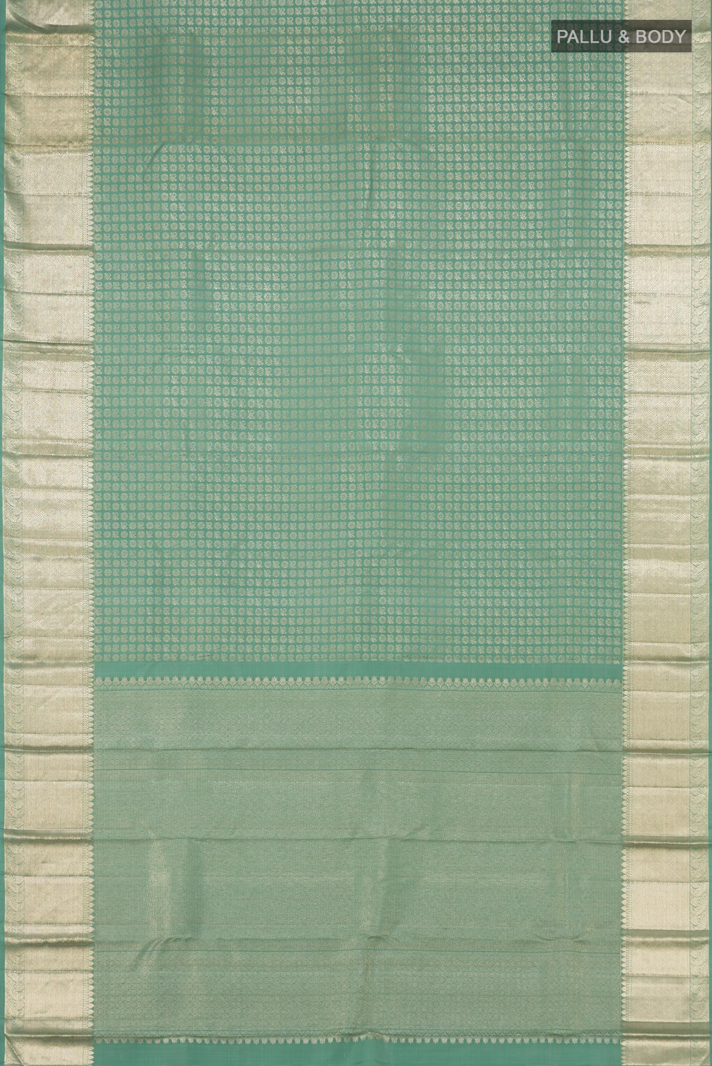 Flat view of Light Green Kanchipuram Silk Saree with Zari Brocade on the body and Zari Border. 