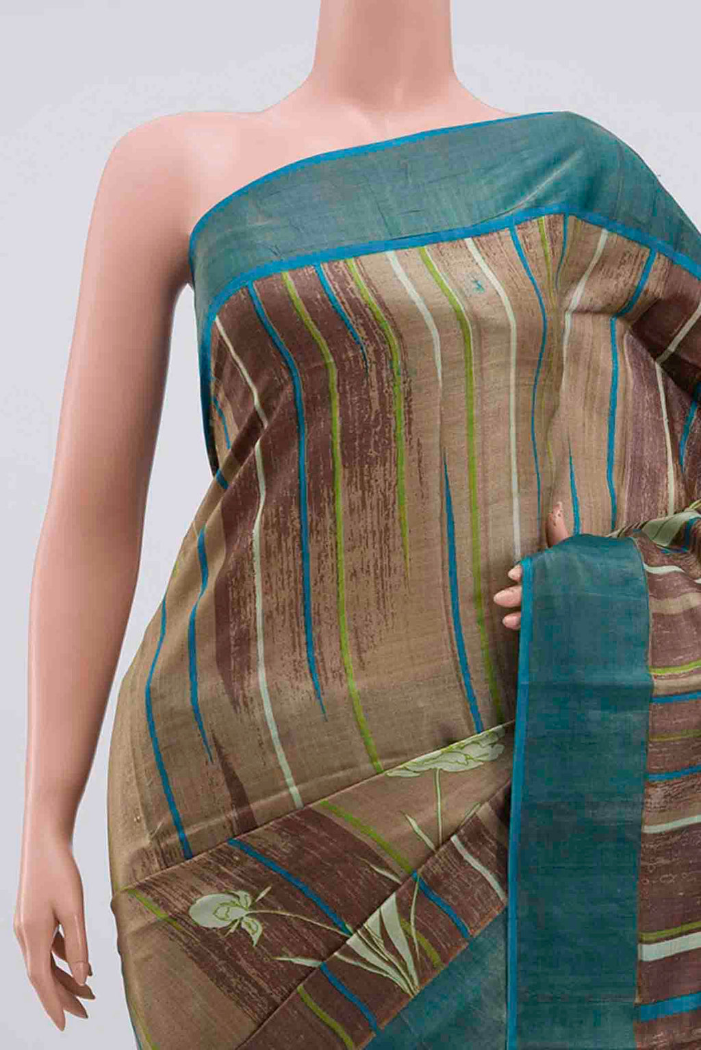 Border image of Multi Color Tussar Silk Saree with Printed design on the body and Zari Border. 