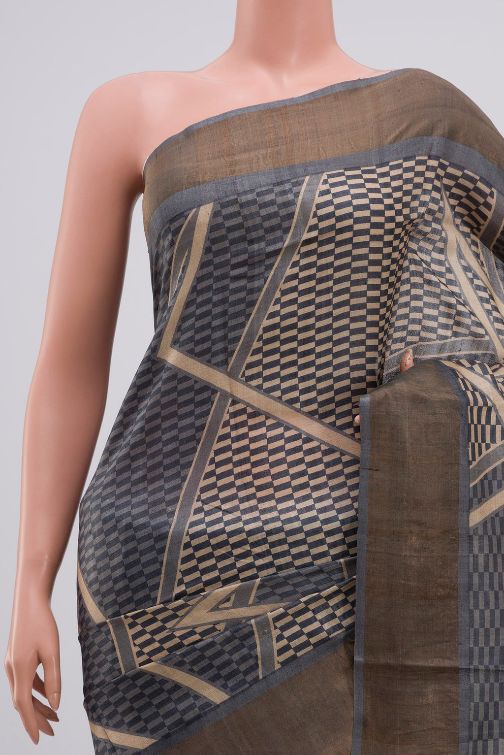 Border image of Grey Tussar Silk Saree with Printed design on the body and Zari Border. 