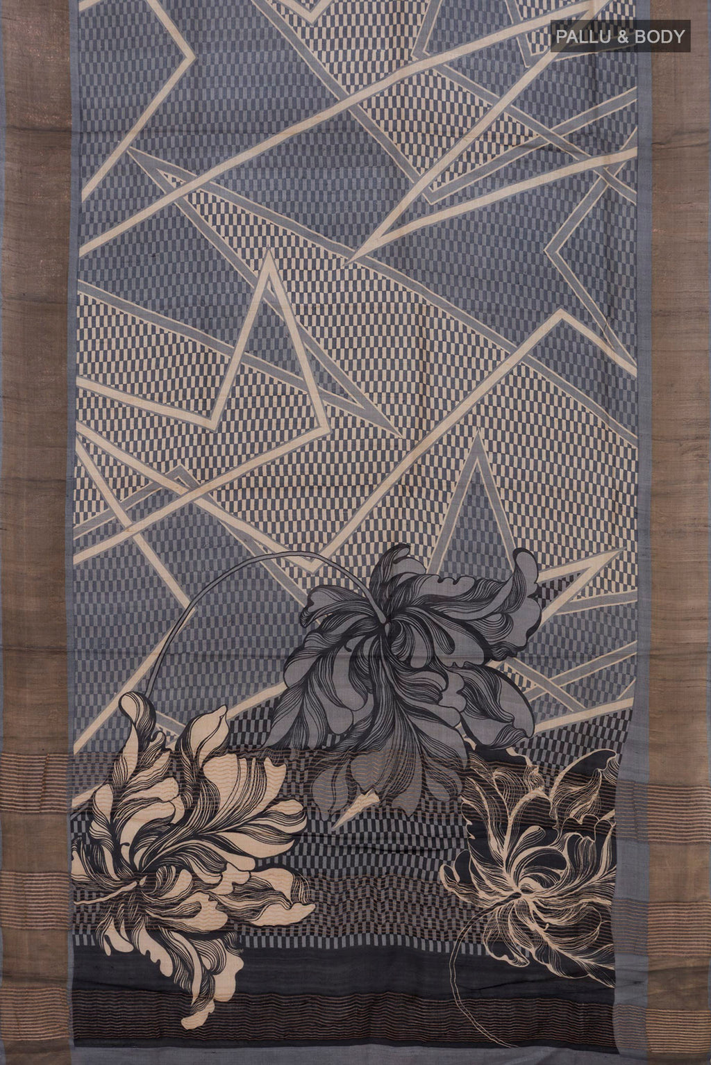 Flat view of Grey Tussar Silk Saree with Printed design on the body and Zari Border. 