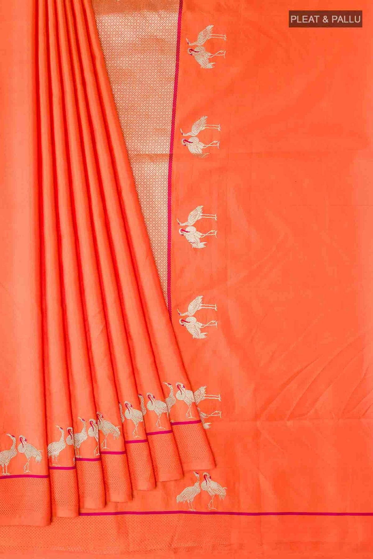 Pleats and pallu of Orange Banarasi Silk Saree with Plain Body and Thread Border
