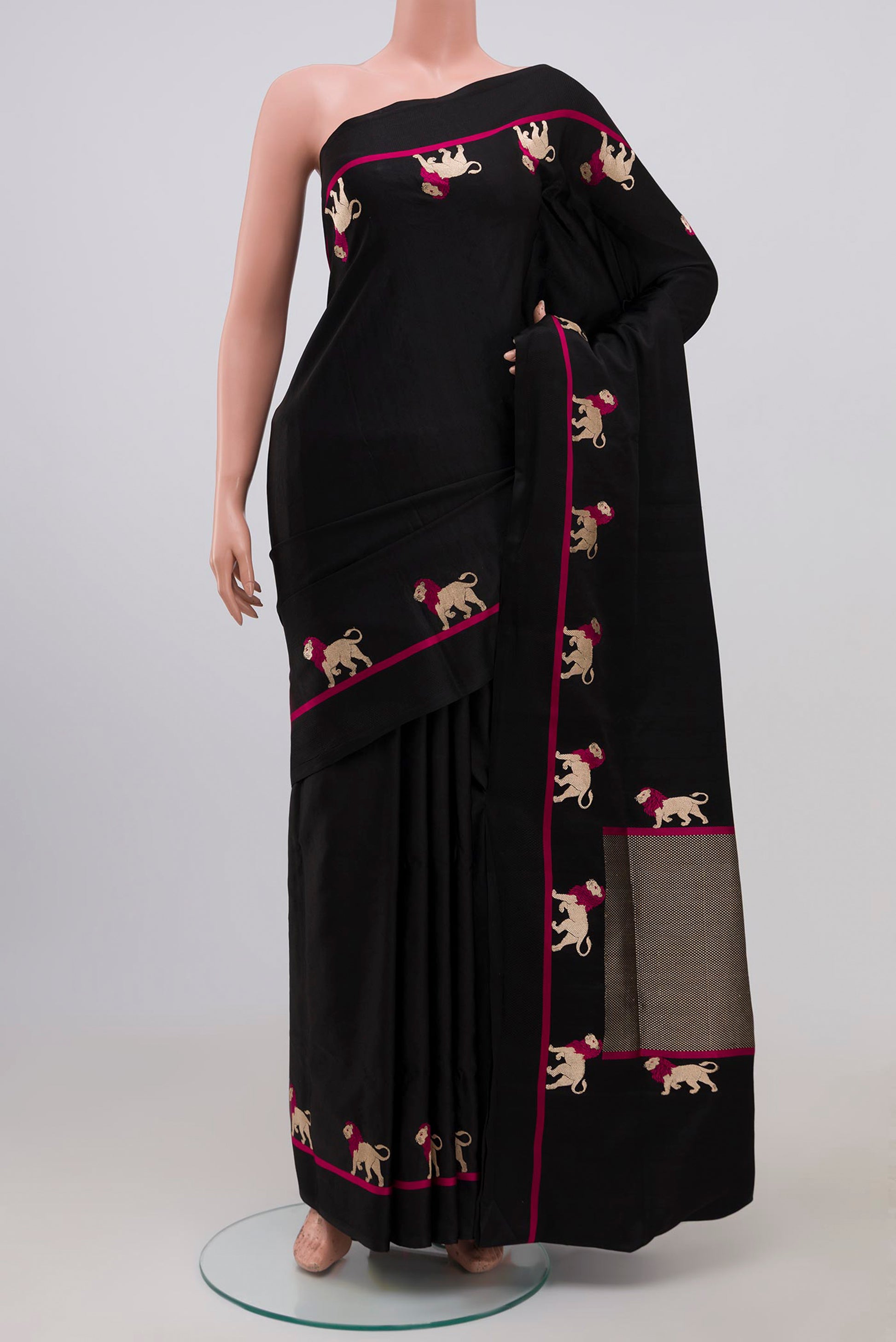Black Banarasi Silk Saree with Plain Body and Fancy Border.  displayed on a mannequin