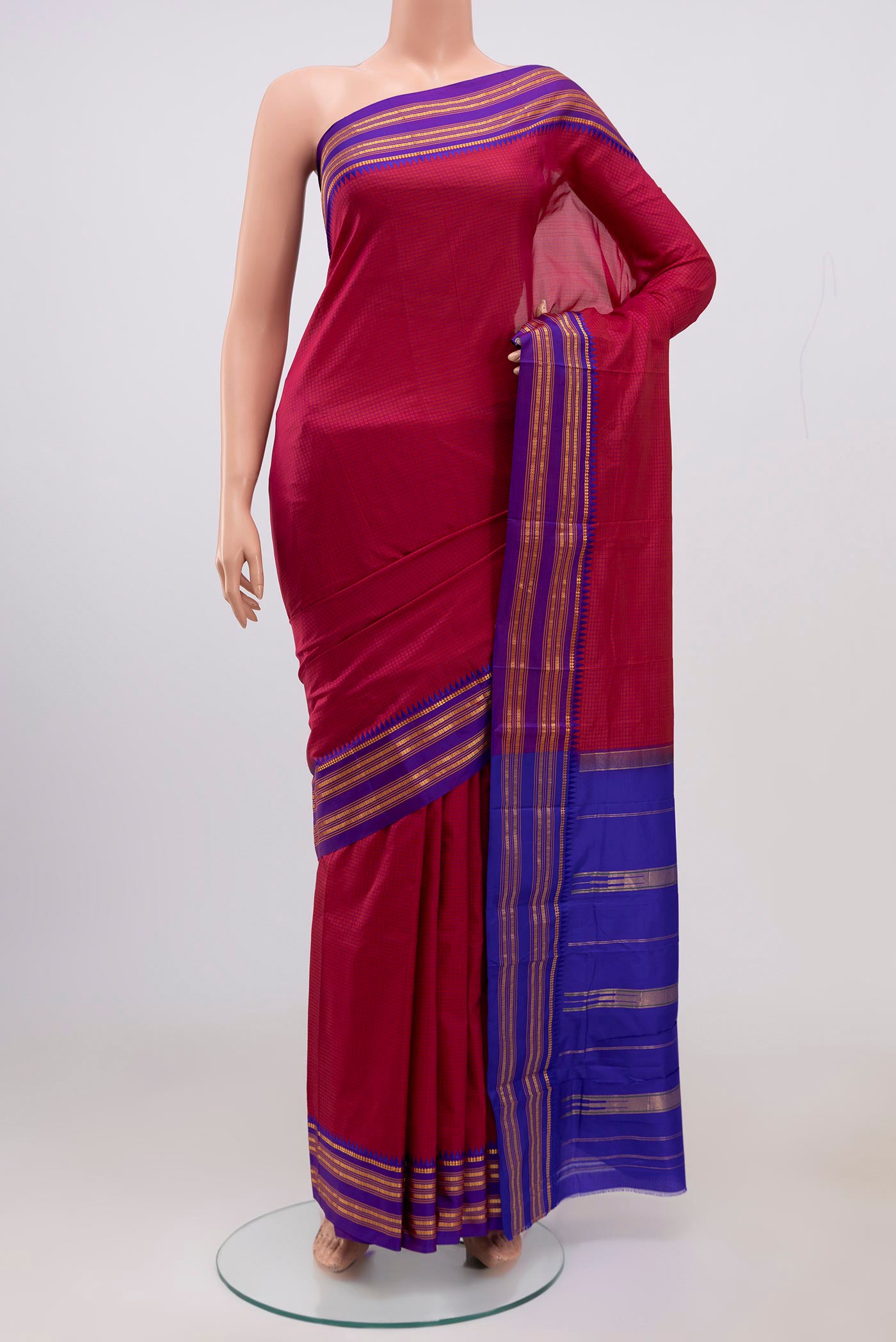 Pink Narayanpet Silk Saree with Checked design on the body and Thin Zari Line.  displayed on a mannequin