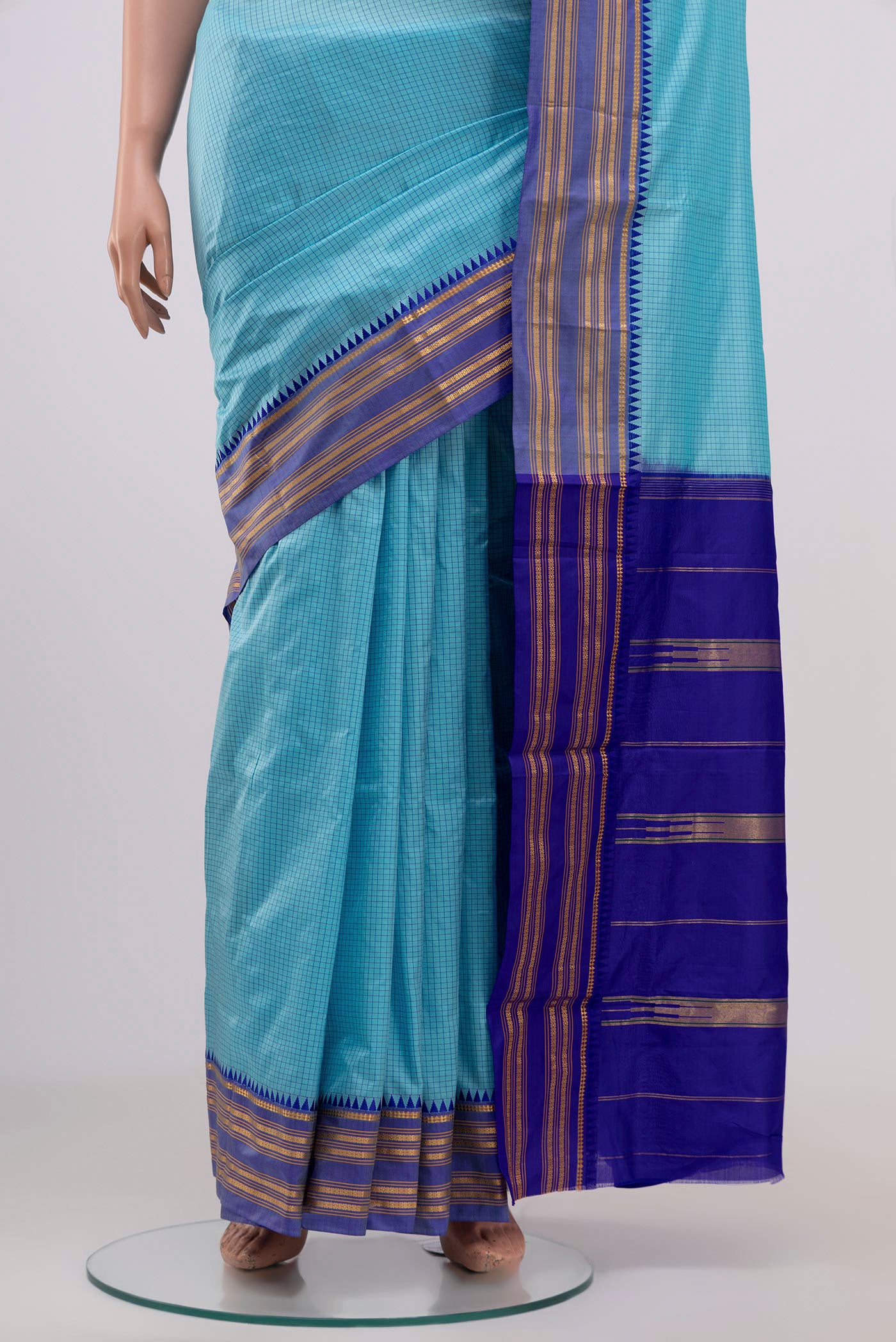 Pleats and pallu of Sky Blue Narayanpet Silk Saree with Checked design on the body and Thin Zari Line. 