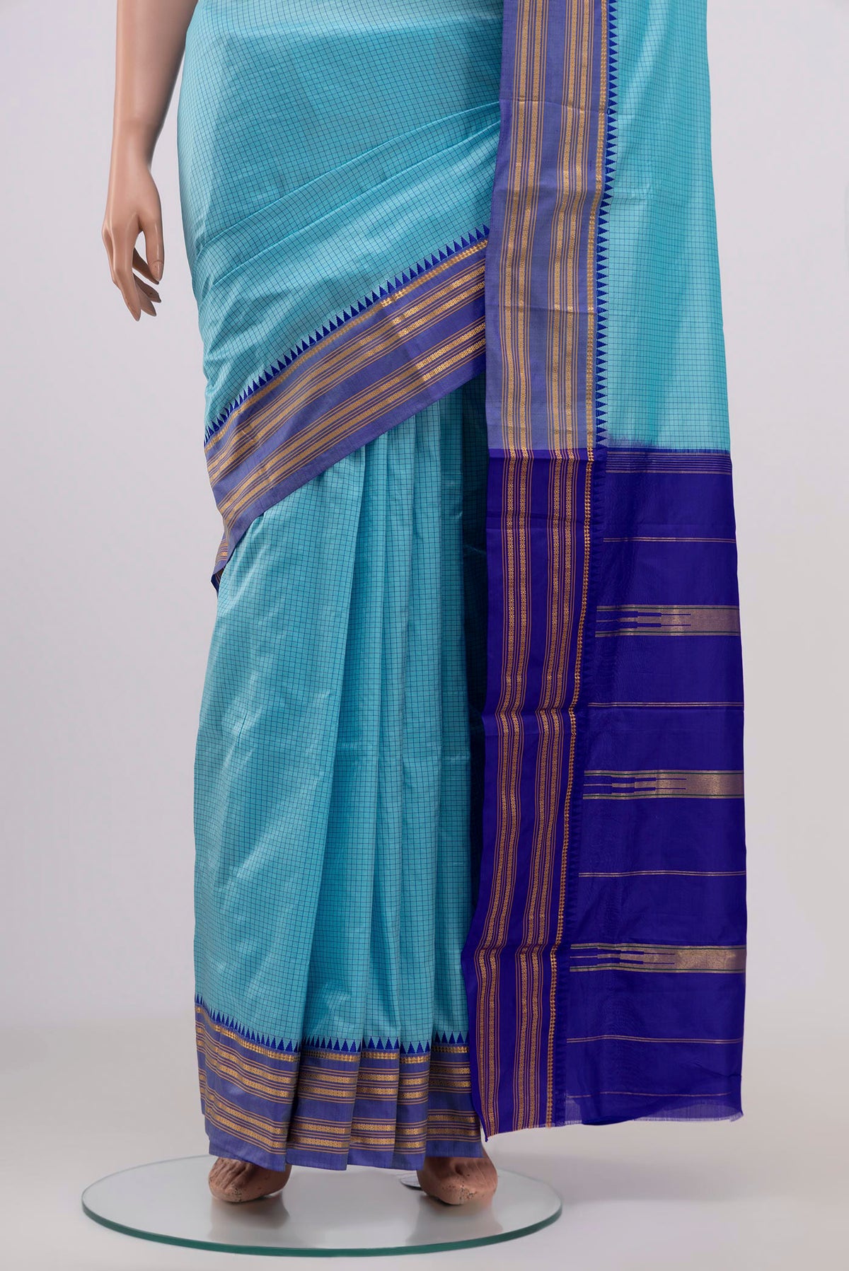 Pleats and pallu of Sky Blue Narayanpet Silk Saree with Checked design on the body and Thin Zari Line. 