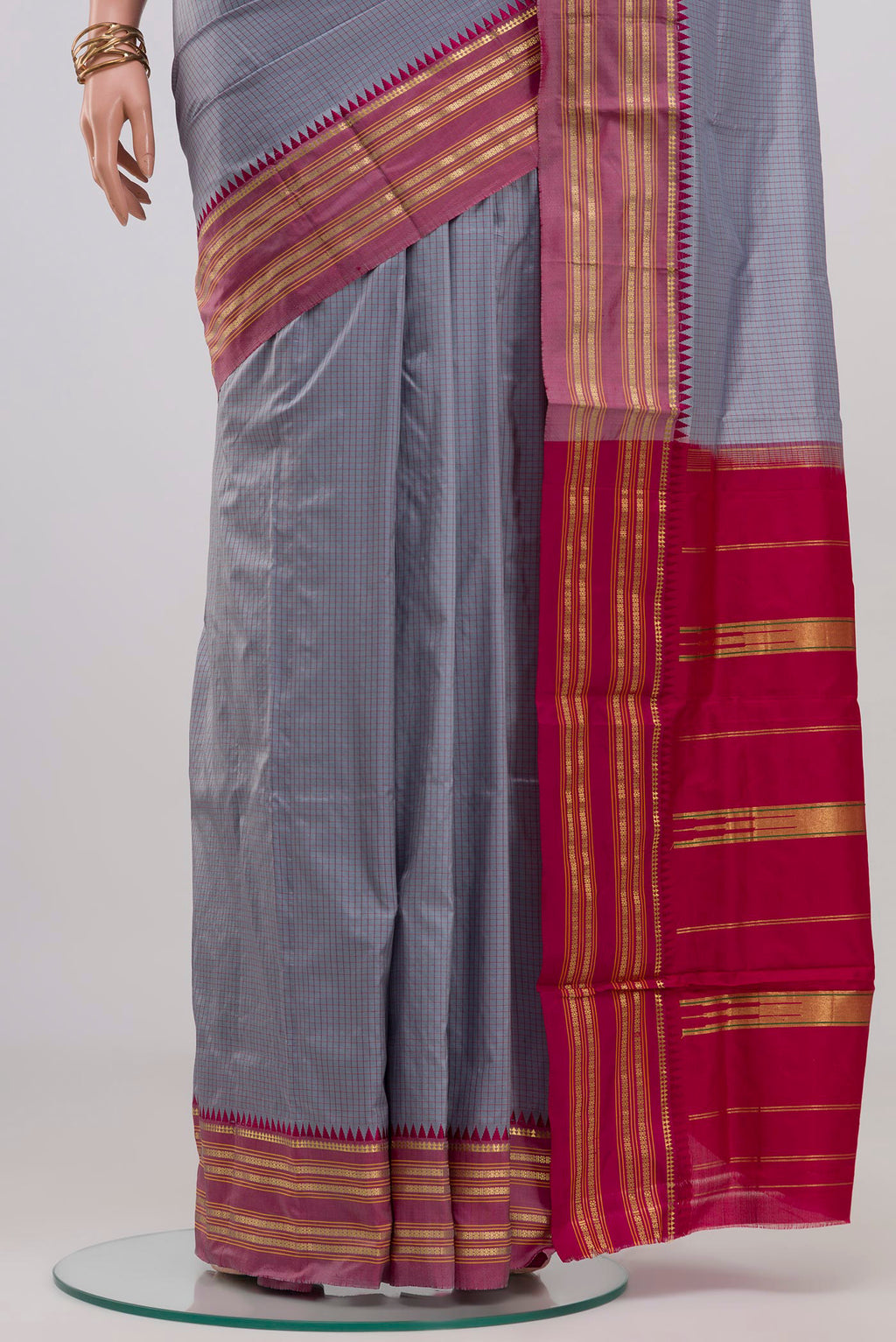 Pleats and pallu of Grey Narayanpet Silk Saree with Checked design on the body and Zari Border. 