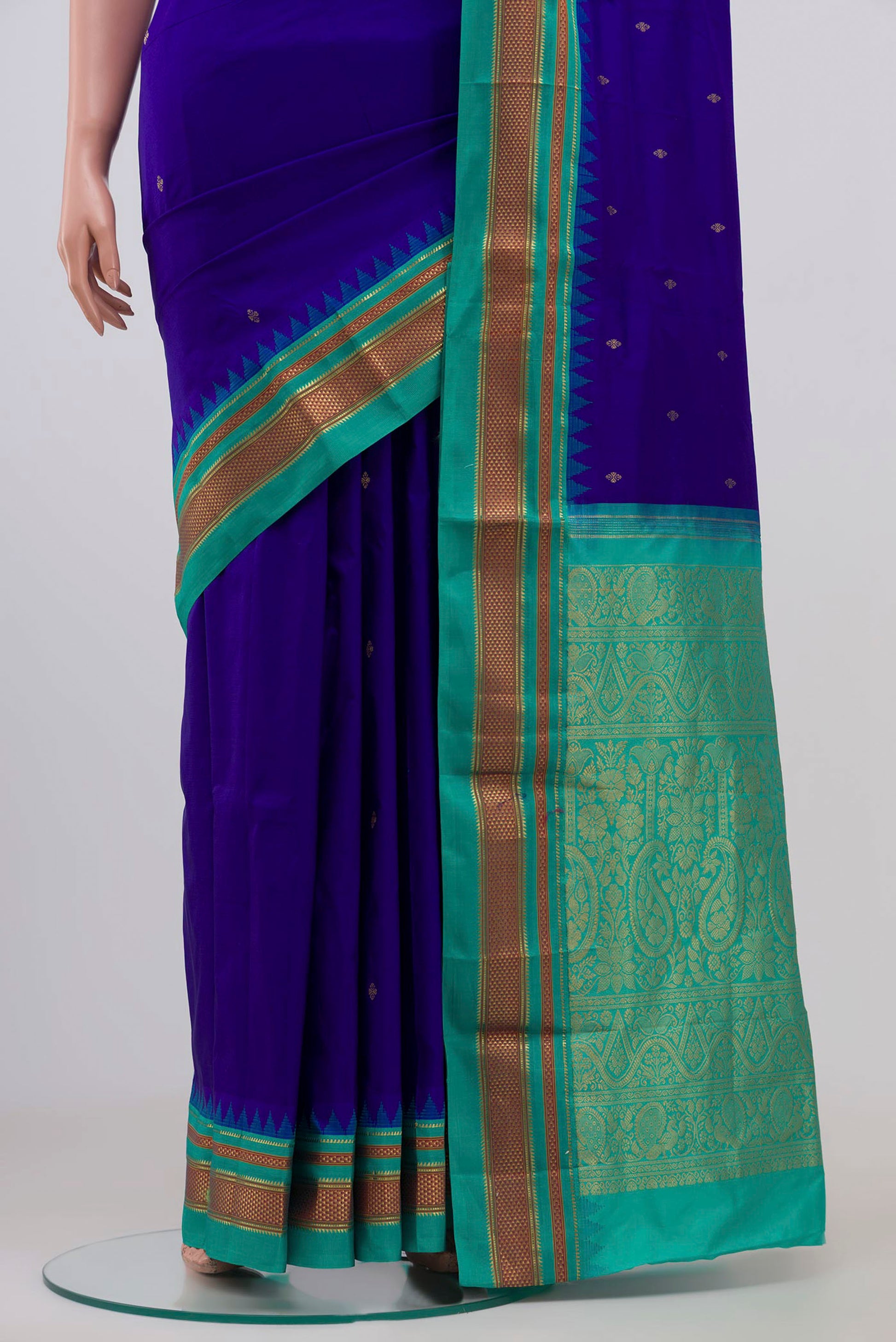 Pleats and pallu of Navy Blue Narayanpet Silk Saree with Zari Butta on the body and Zari Border. 