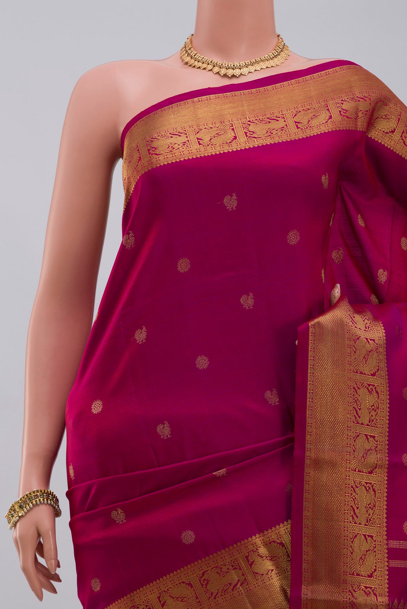 Border image of Pure Silk Pure Zari Pink Kanjivaram Saree with Zari Butta on the body and Zari Border. 
