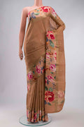 Brown Tussar Silk Saree with Zari Butta on the body and Printed Border displayed on a mannequin