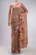 Peach Tussar Silk Saree with Zari Butta on the body and Printed Border displayed on a mannequin