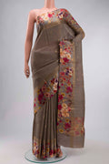 Grey Tussar Silk Saree with Zari Butta on the body and Printed Border displayed on a mannequin