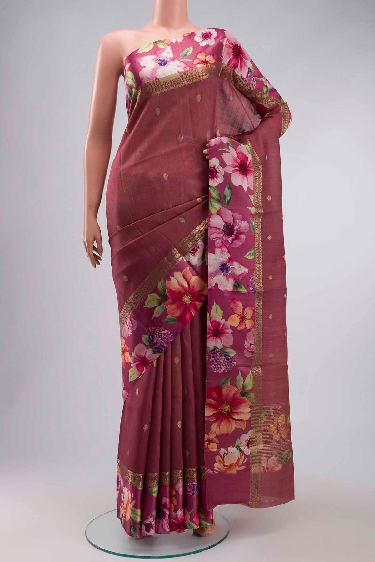 Mauve Tussar Silk Saree with Zari Butta on the body and Printed Border displayed on a mannequin