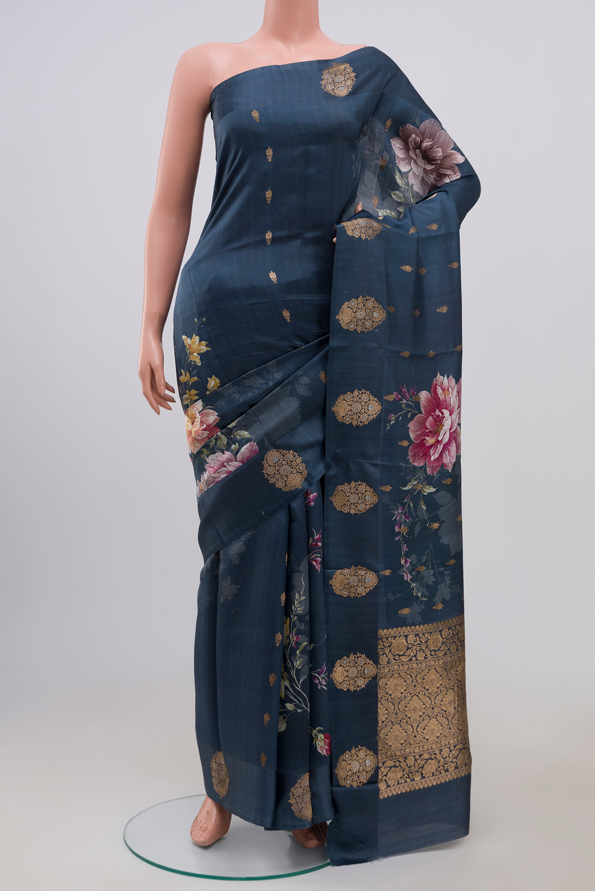 Blue Grey Banarasi Raw Silk Saree with Zari Butta on the body and Fancy Border.  displayed on a mannequin
