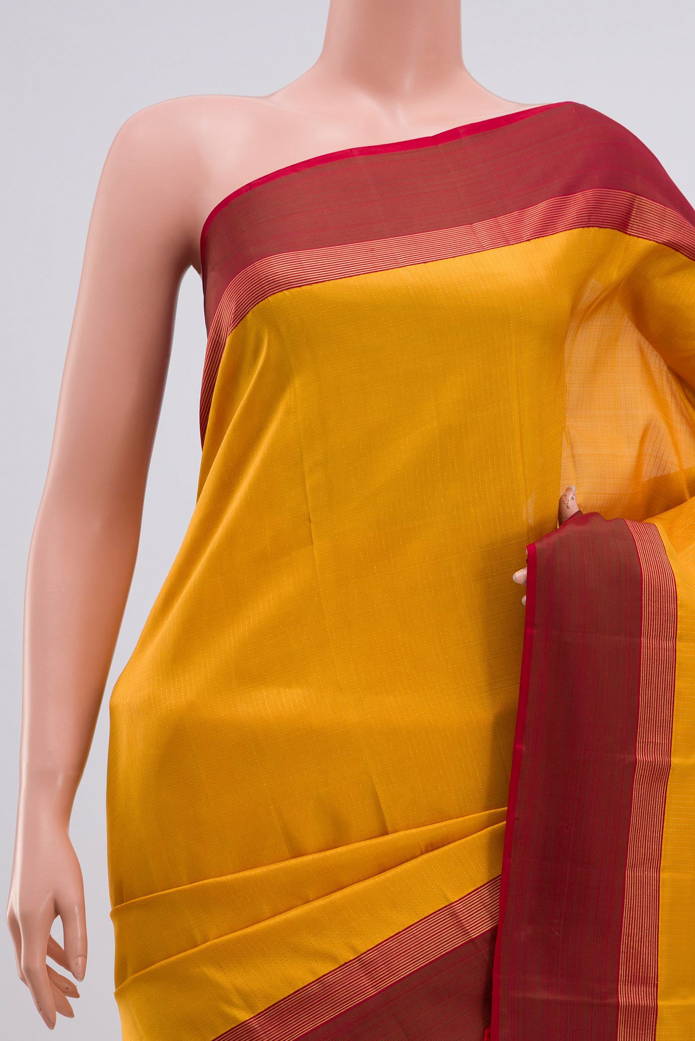 Border image of Pure Silk Pure Zari Yellow Kanjivaram Saree with Stripes on the body and Thin Zari Line. 