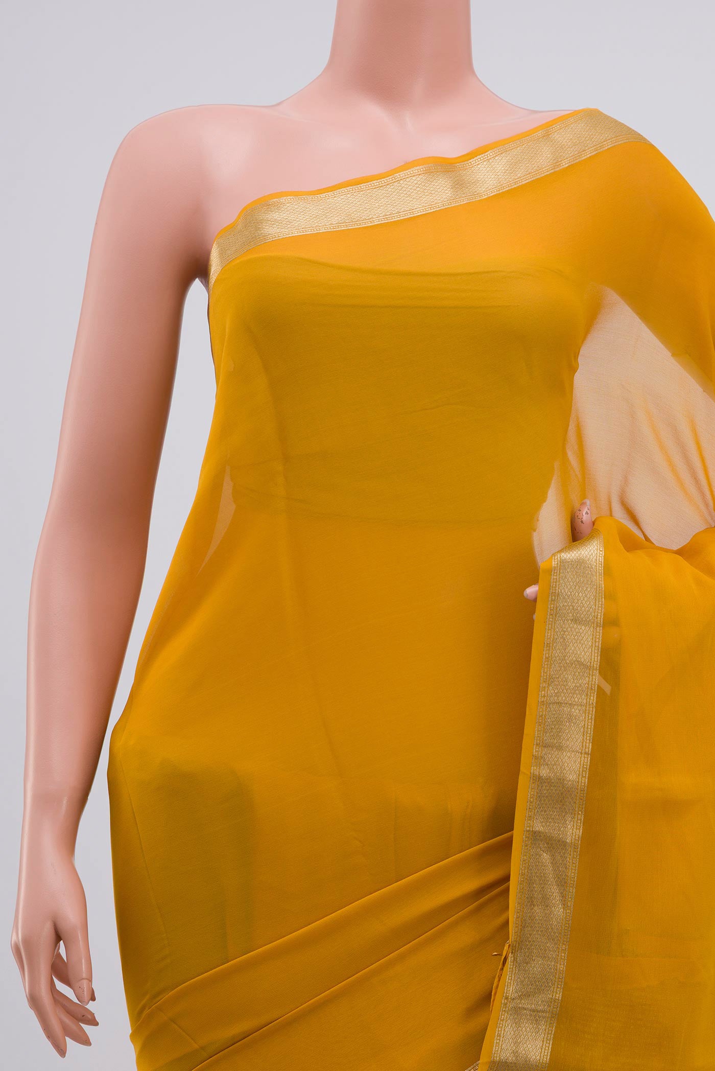 Border image of Yellow Chiffon Saree with Plain Body and Zari Border. 