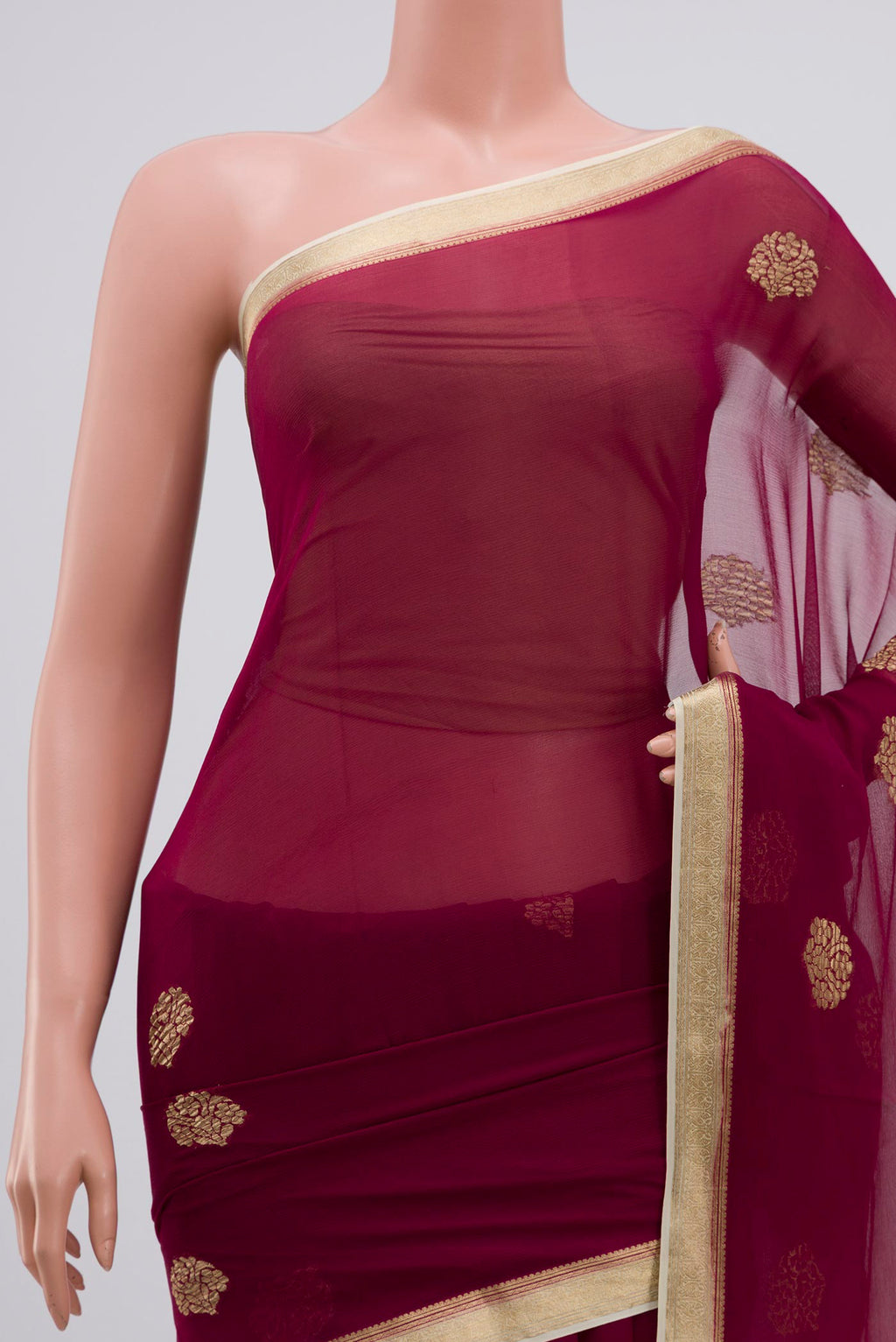 Border image of Purple Chiffon Saree with Zari Butta on the body and Zari Border. 