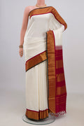 Pure Silk White Kanchipuram Nine Yards Saree with Plain Body and Zari Border.  displayed on a mannequin