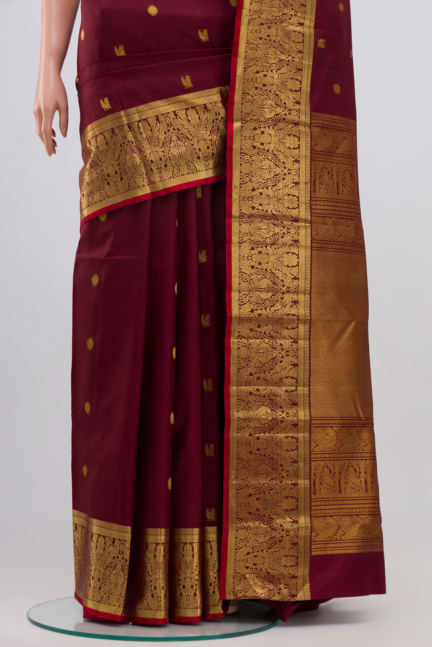Pleats and pallu of Coffee Brown Kanjivaram Silk Saree with Zari Butta on the body and Zari Border. 
