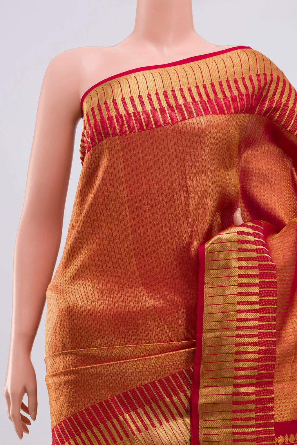 Border image of Maroon Kanchipuram Silk Saree with Zari Brocade on the body and Zari Border. 