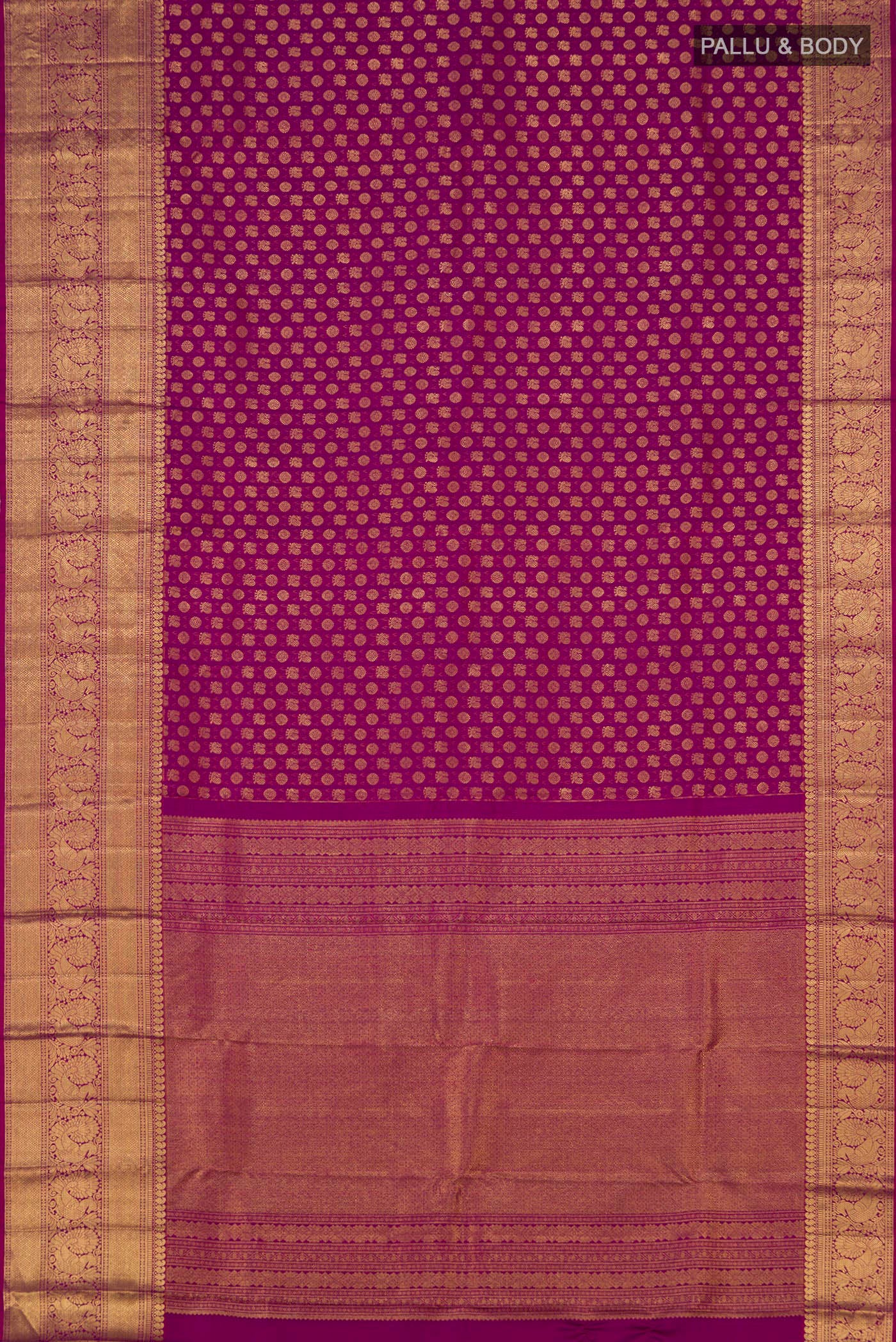 Flat view of Magenta Kanchipuram Silk Saree with Zari Brocade on the body and Zari Border. 
