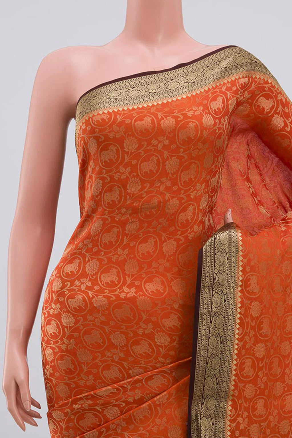 Border image of Orange Mysore Silk Saree with Zari Brocade on the body and Zari Border. 