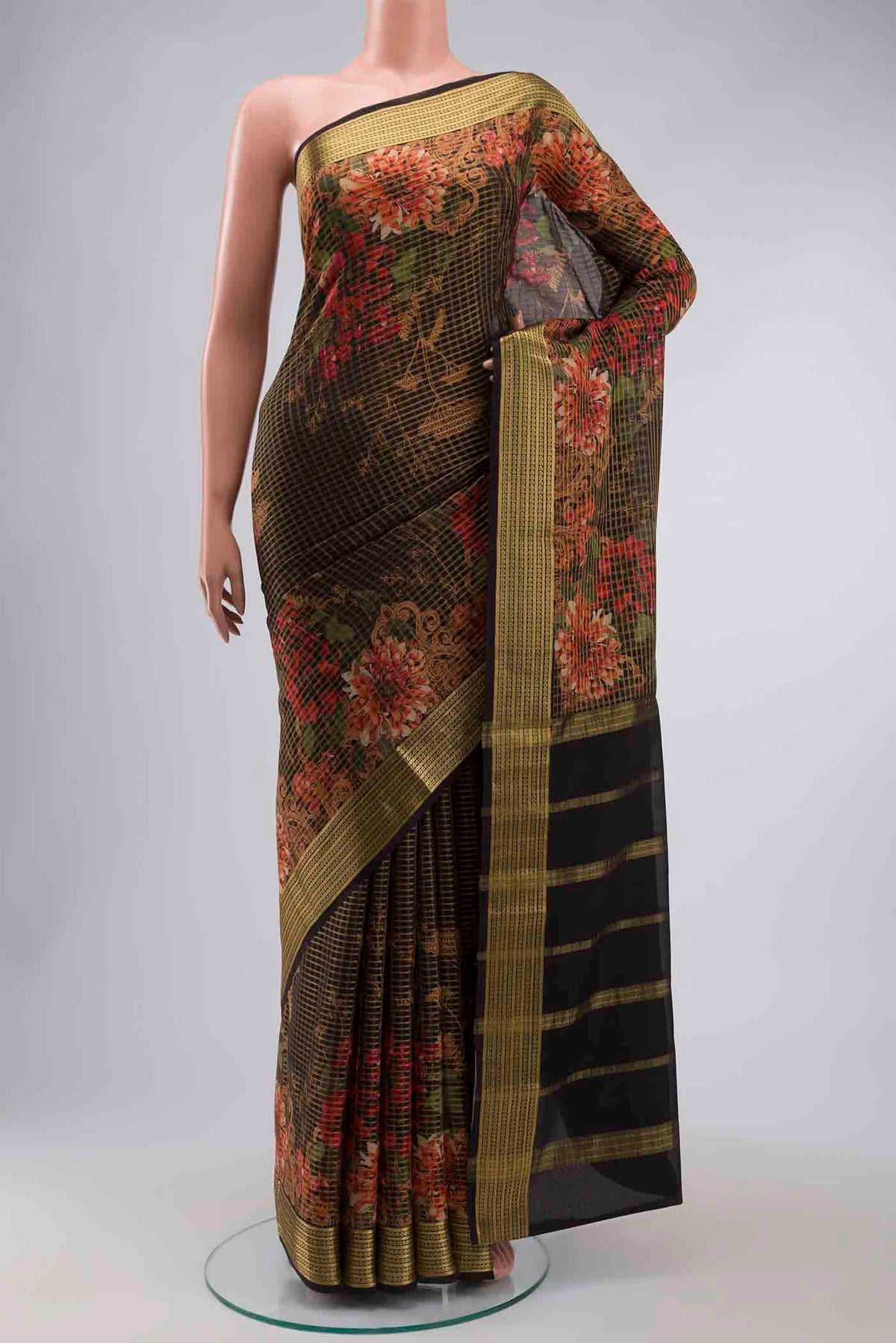 Black Mysore Crepe Saree with Checked design on the body and Zari Border displayed on a mannequin
