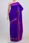 Blue Kanchipuram Silk Saree with Jacquard design on the body and Thin Zari Line.  displayed on a mannequin