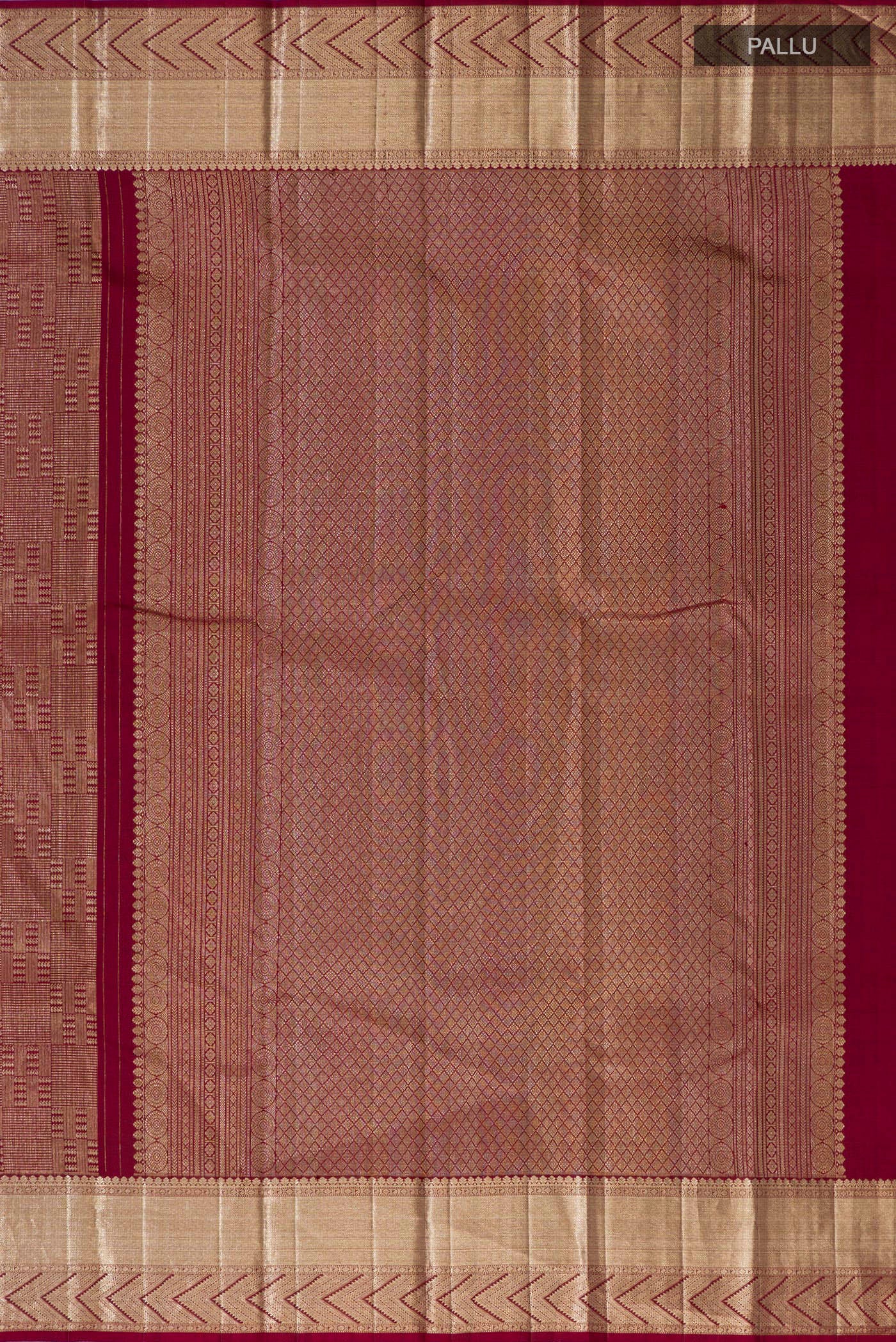 Close up image of the pallu of Maroon Kanchipuram Silk Saree with Zari Brocade on the body and Zari Border. 