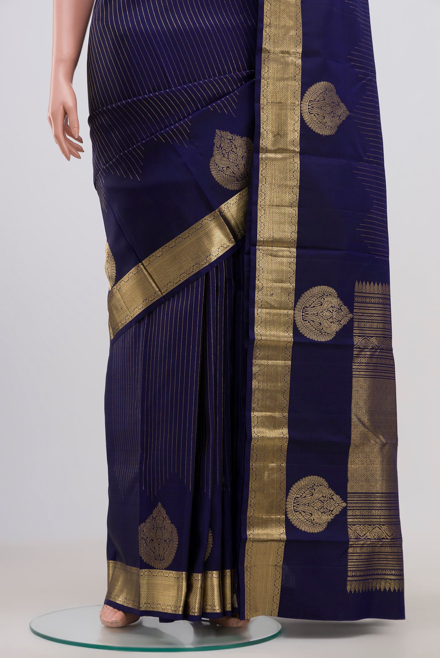 Pleats and pallu of Blue Kanjivaram Saree with Stripes on the body and Zari Border. 