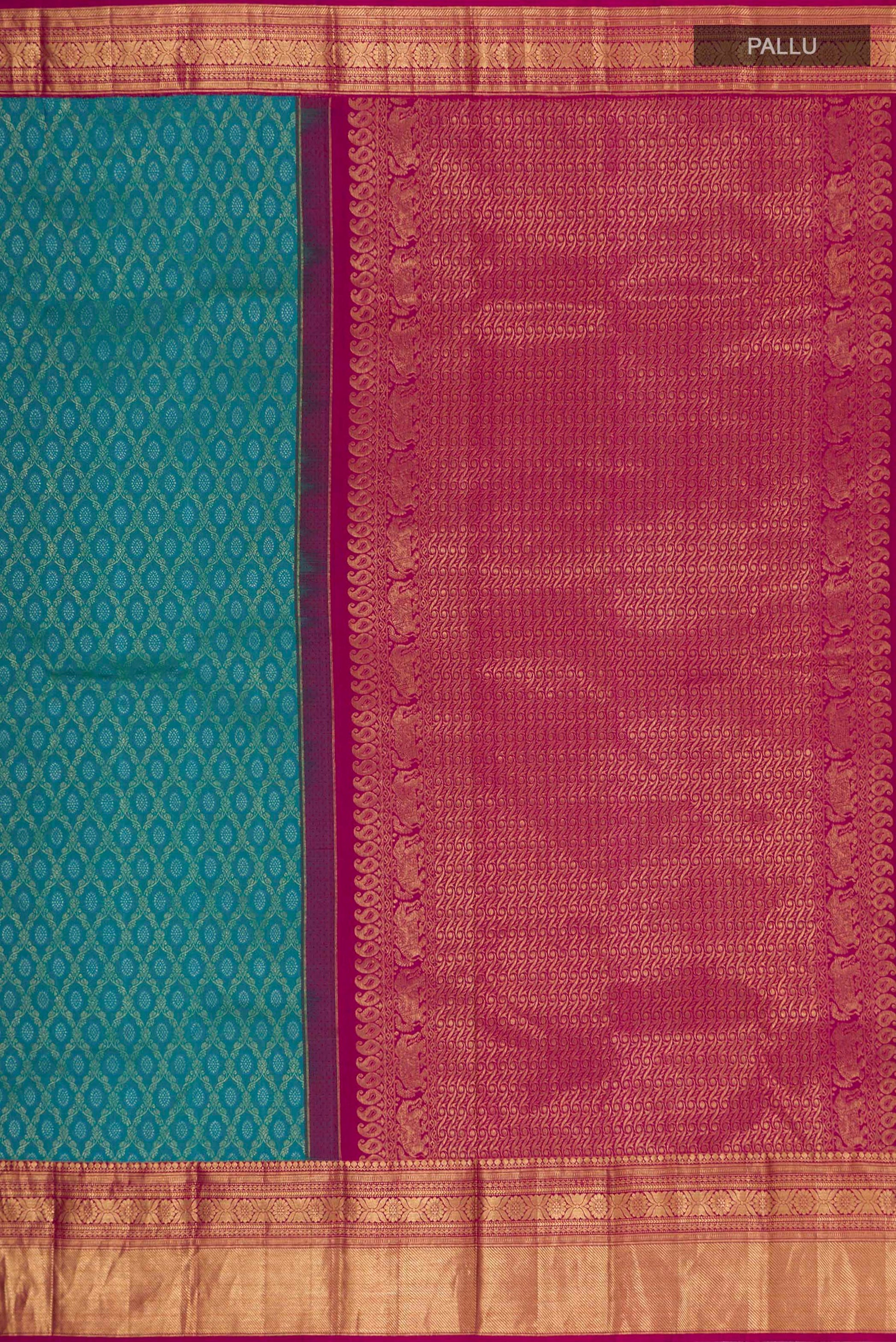 Close up image of the pallu of Peacock Blue Kanjivaram Silk Saree with Zari Brocade on the body and Zari Border. 