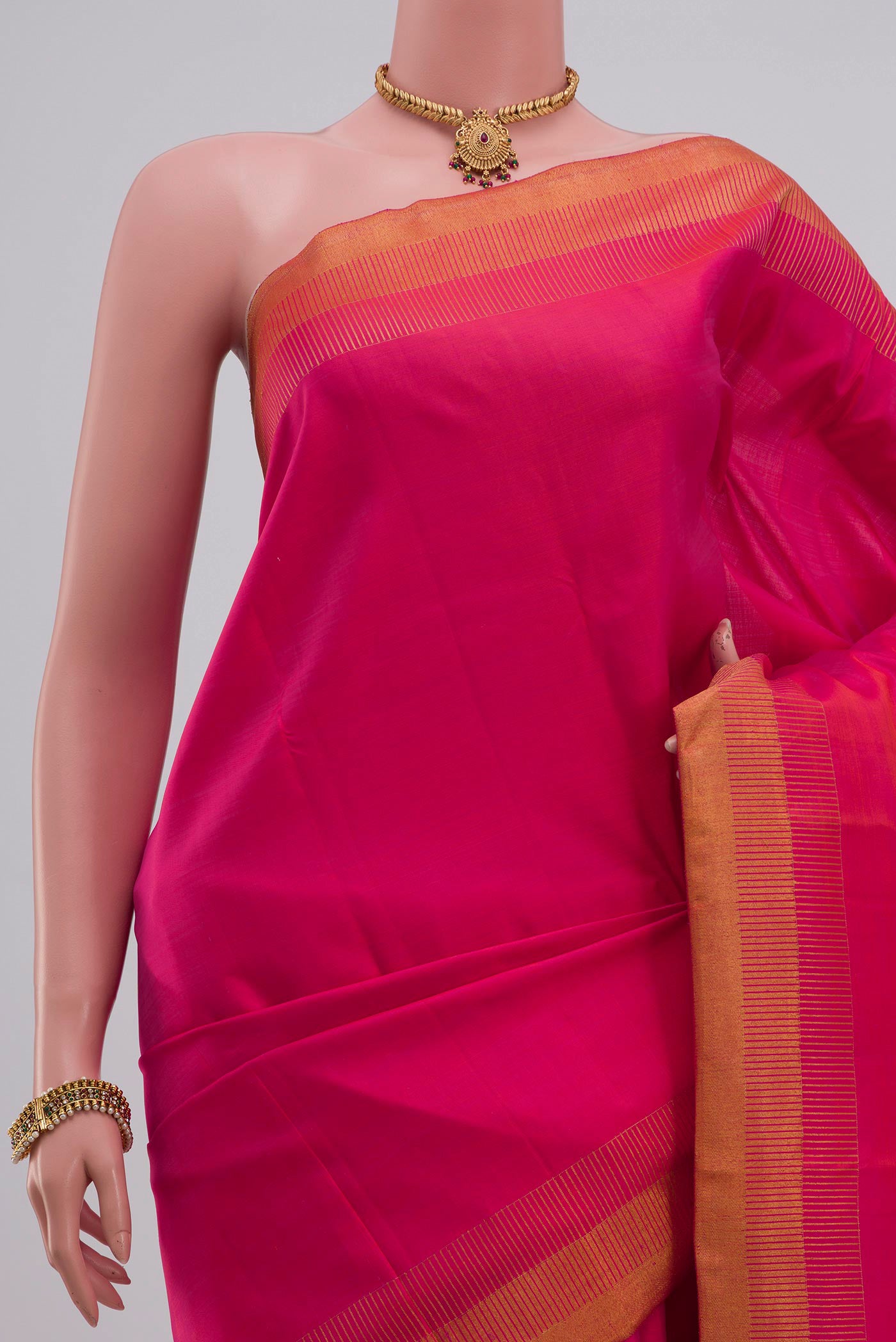 Border image of Pure Silk Pure Zari Pink Kanchipuram Saree with Plain Body and Zari Border. 