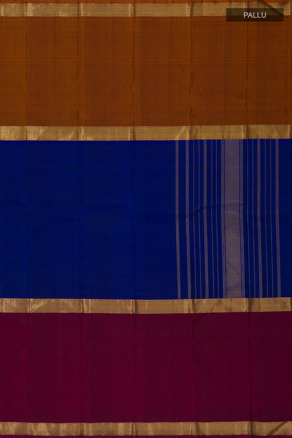 Close up image of the pallu of Pure Silk Pure Zari Blue Kanchipuram Saree with Plain Body and Ganga Jamuna Border. 