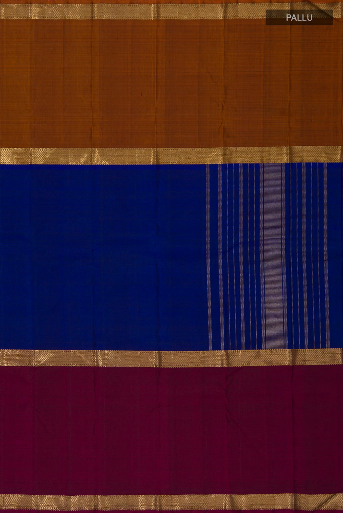 Close up image of the pallu of Pure Silk Pure Zari Blue Kanchipuram Saree with Plain Body and Ganga Jamuna Border. 