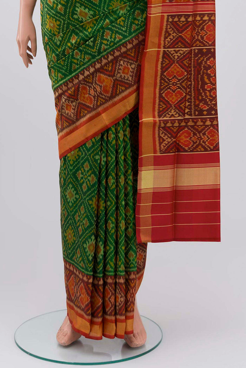 Pleats and pallu of Green Rajkot Patola Silk Saree with Pure Ikat on the body and Zari Border