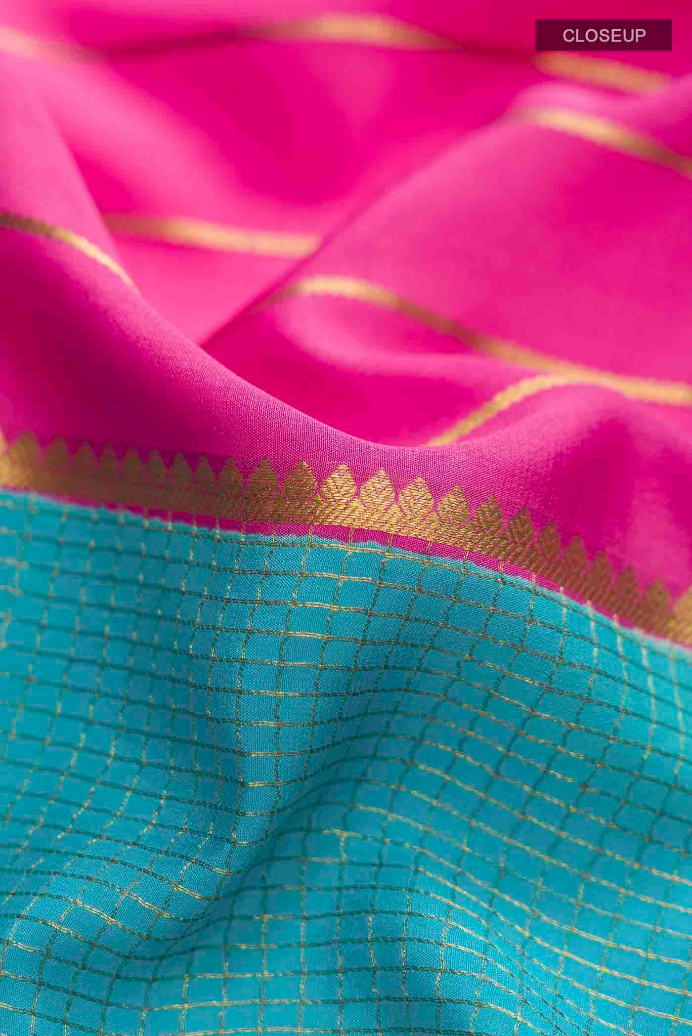 Close up of Multi Color Mysore Crepe Saree with Stripes on the body and Zari Border displaying folds