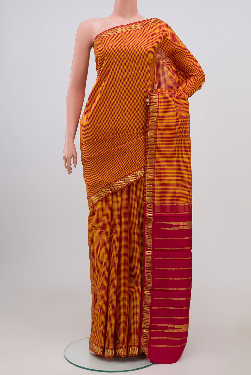 Pure Silk Pure Zari Multi Color Kanjivaram Saree with Checked design on the body and Zari Border.  displayed on a mannequin