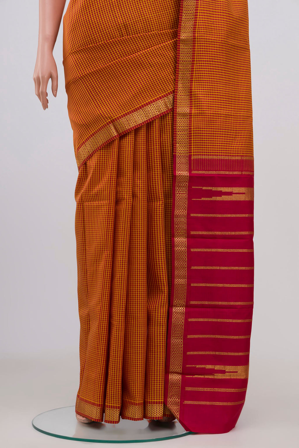 Pleats and pallu of Pure Silk Pure Zari Multi Color Kanjivaram Saree with Checked design on the body and Zari Border. 
