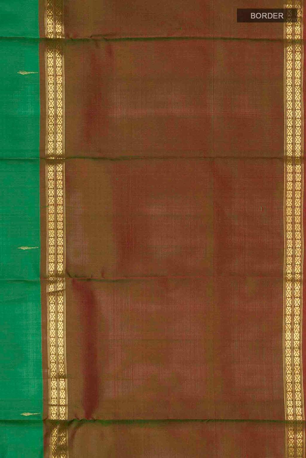 Border image of Green Kanchipuram Silk Saree with Zari Butta on the body and Zari Border