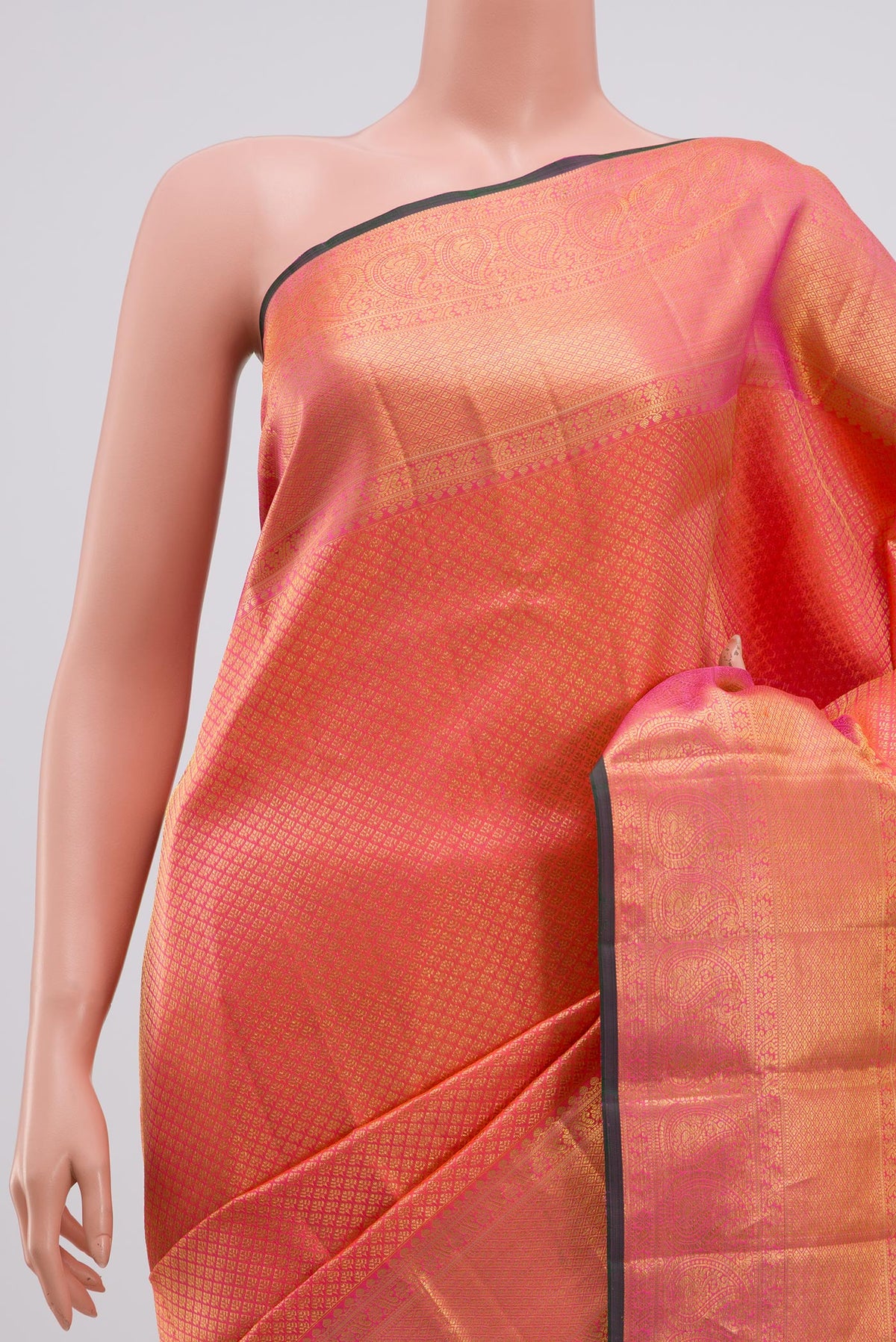 Border image of Orange Kanjivaram Saree with Zari Brocade on the body and Zari Border. 