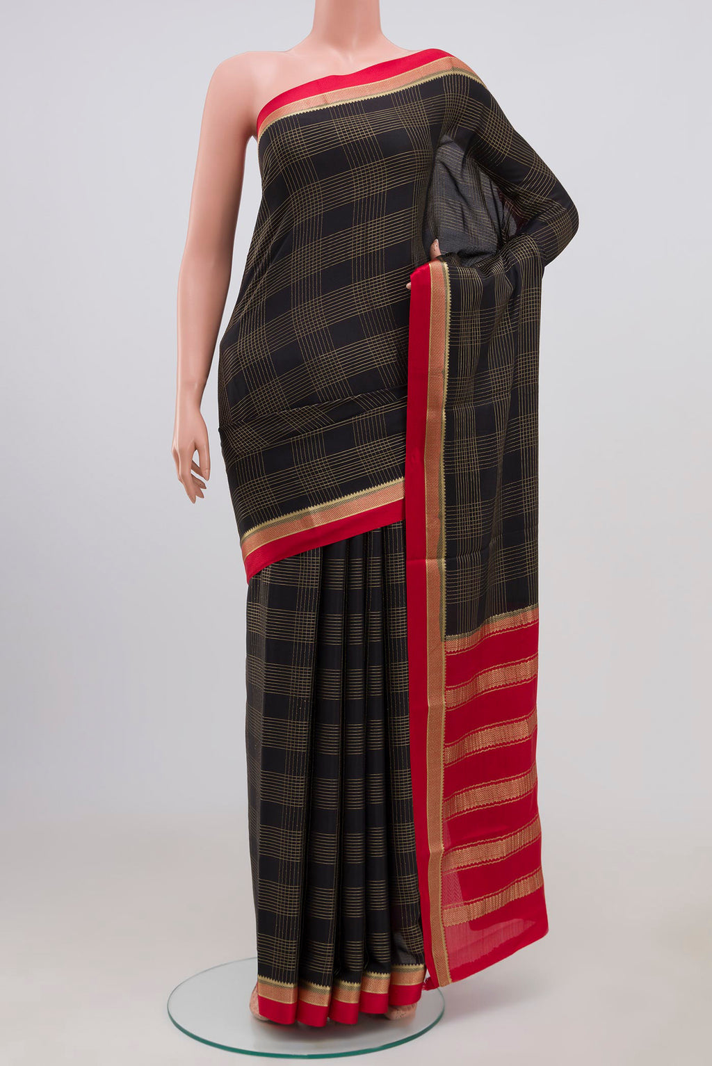 Black Mysore Crepe Saree with Checked design on the body and Thin Zari Line.  displayed on a mannequin