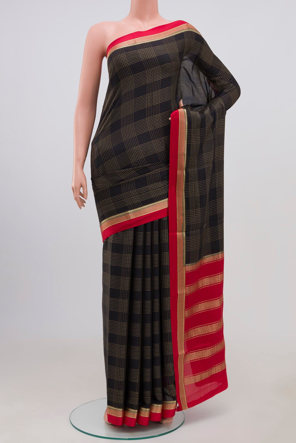 Black Mysore Crepe Saree with Checked design on the body and Thin Zari Line.  displayed on a mannequin