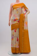 Beige Printed Silk Saree with Printed design on the body and Zari Border.  displayed on a mannequin