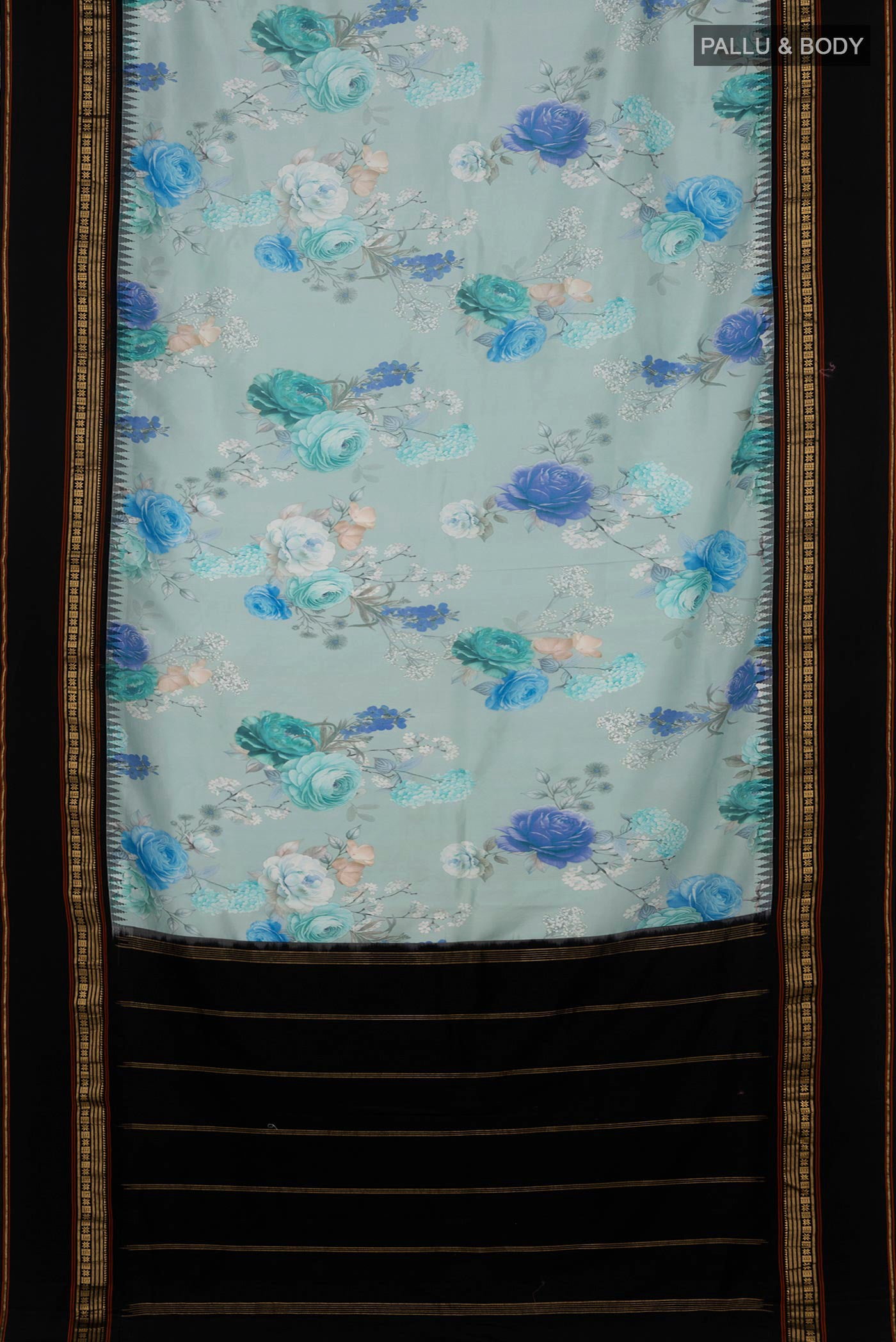 Flat view of Sky Blue Printed Silk Saree with Fancy on the body and Zari Border. 