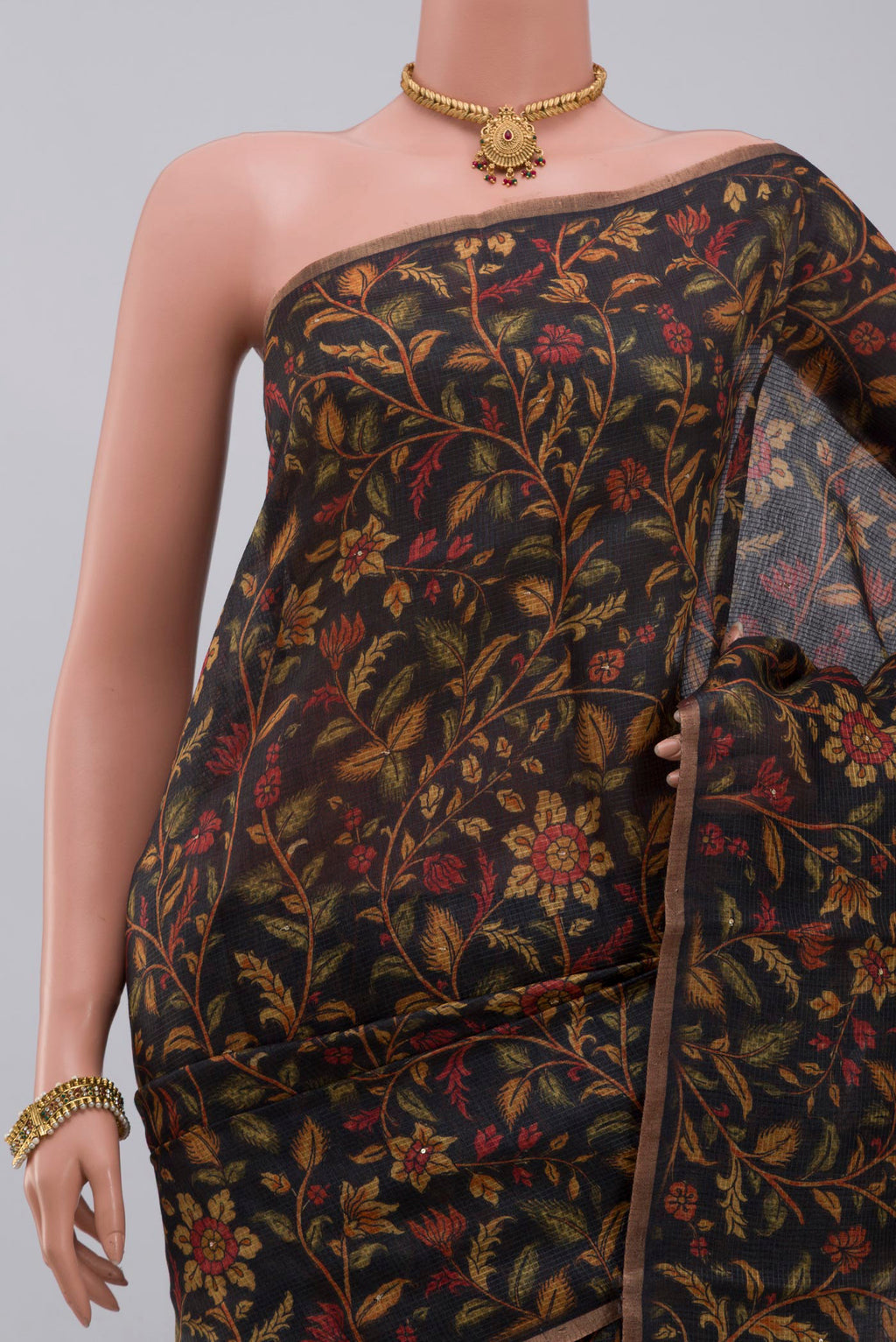 Border image of Black Tussar Silk Saree with Printed design on the body and Thin Zari Line. 
