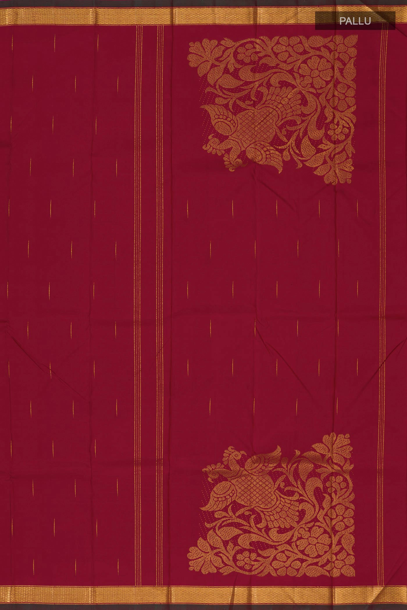 Close up image of the pallu of Pure Silk Pure Zari Maroon Kanjivaram Saree with Zari Butta on the body and Zari Border. 