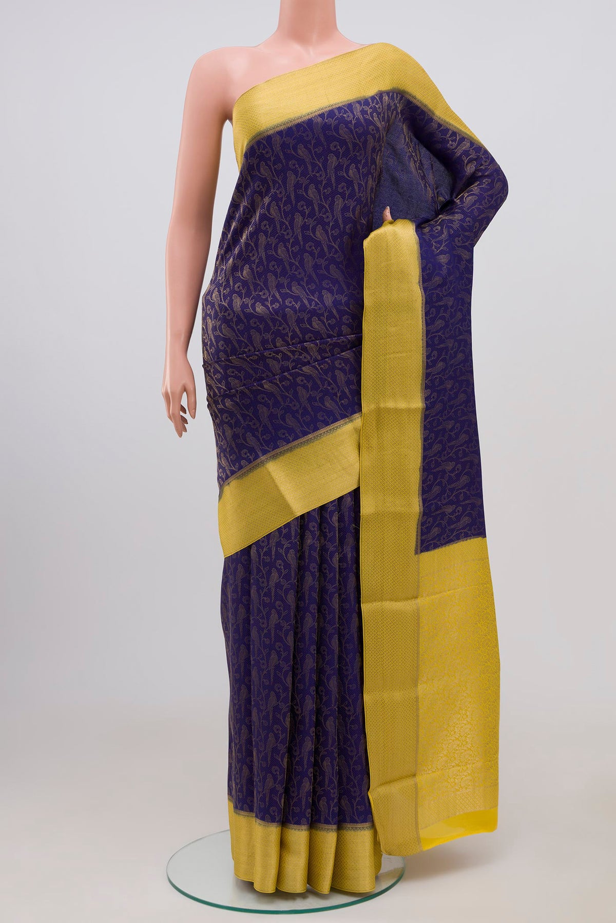 Blue Mysore Crepe Saree with Zari Brocade on the body and Zari Border.  displayed on a mannequin