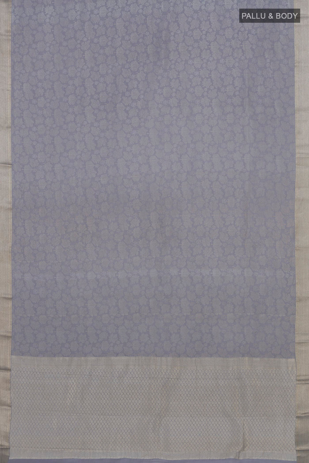 Flat view of Grey Mysore Crepe Saree with Zari Brocade on the body and Zari Border. 
